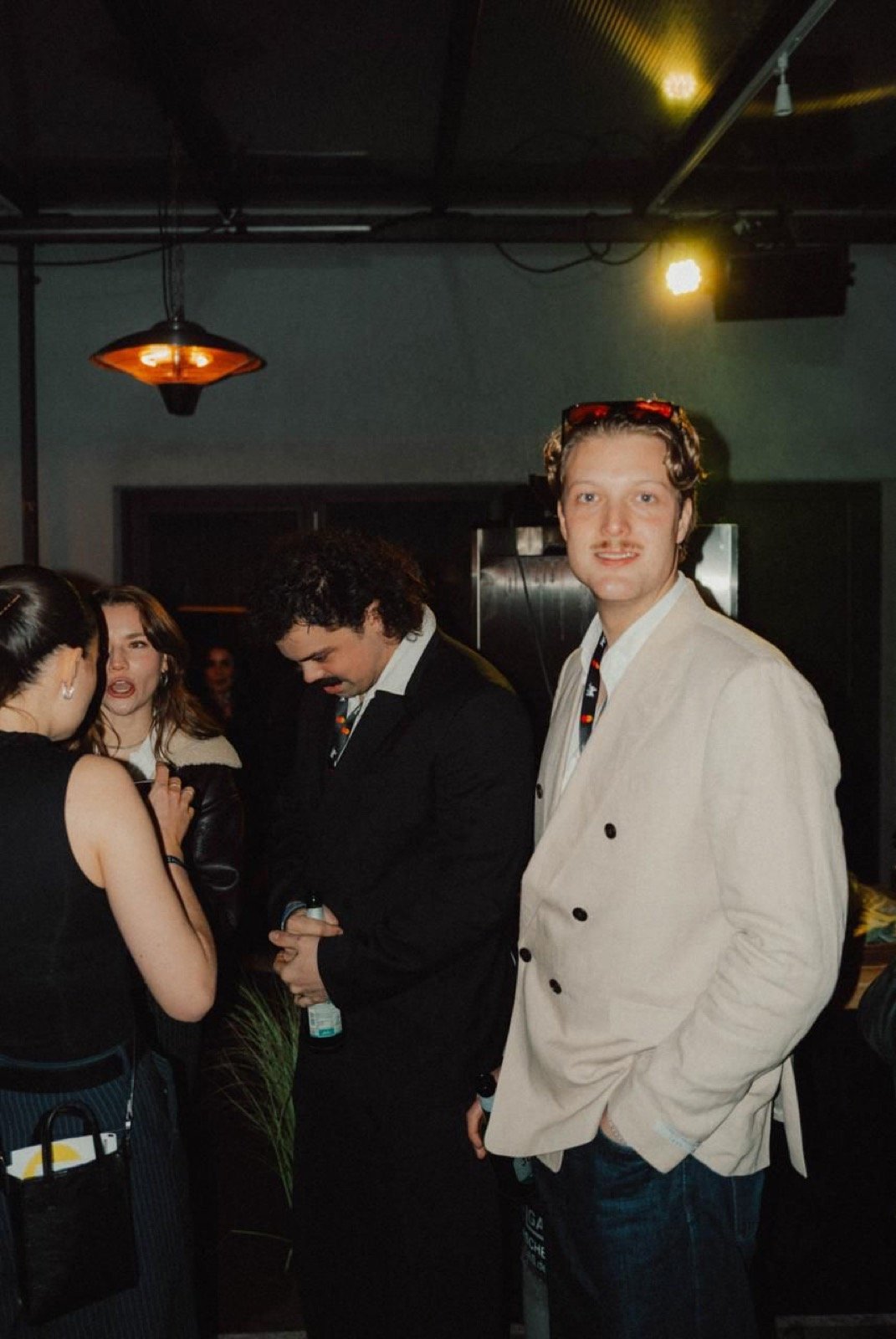 An evening reception at the Berlinale, people in conversation